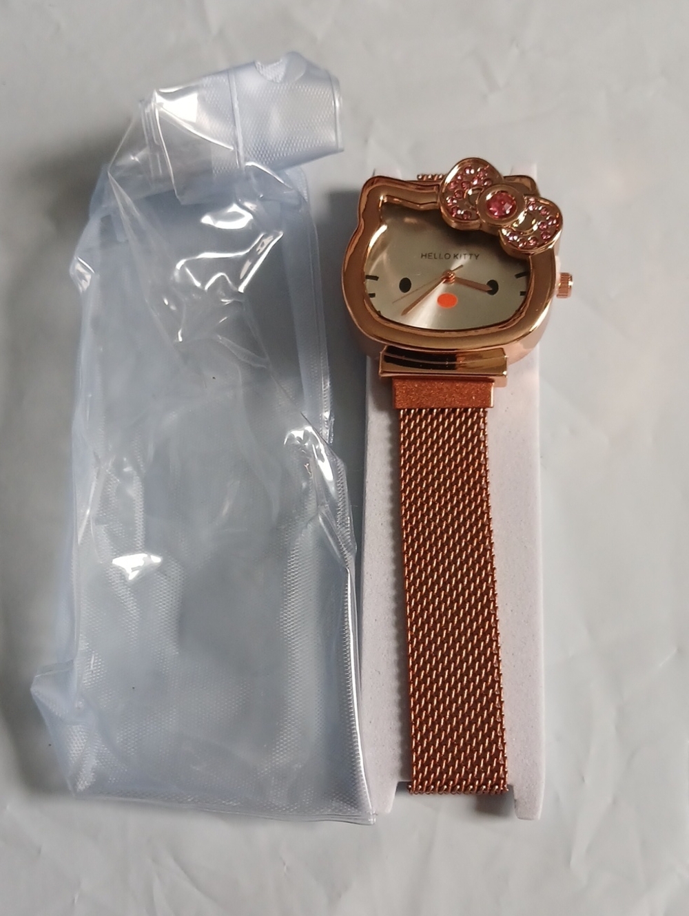 Hello Kitty Rose Gold Tone Mesh Bracelet Watch with Pink Crystal Bow